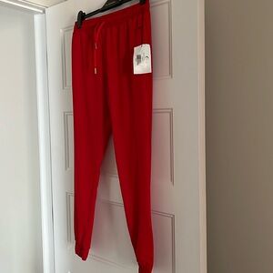 NWT Zyia red everywhere zipper jogger size M